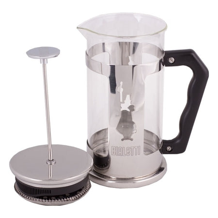 Bialetti stempelkande i glas og rustfrit stål vist med aftageligt stempelfilter og sort håndtag på lys baggrund.